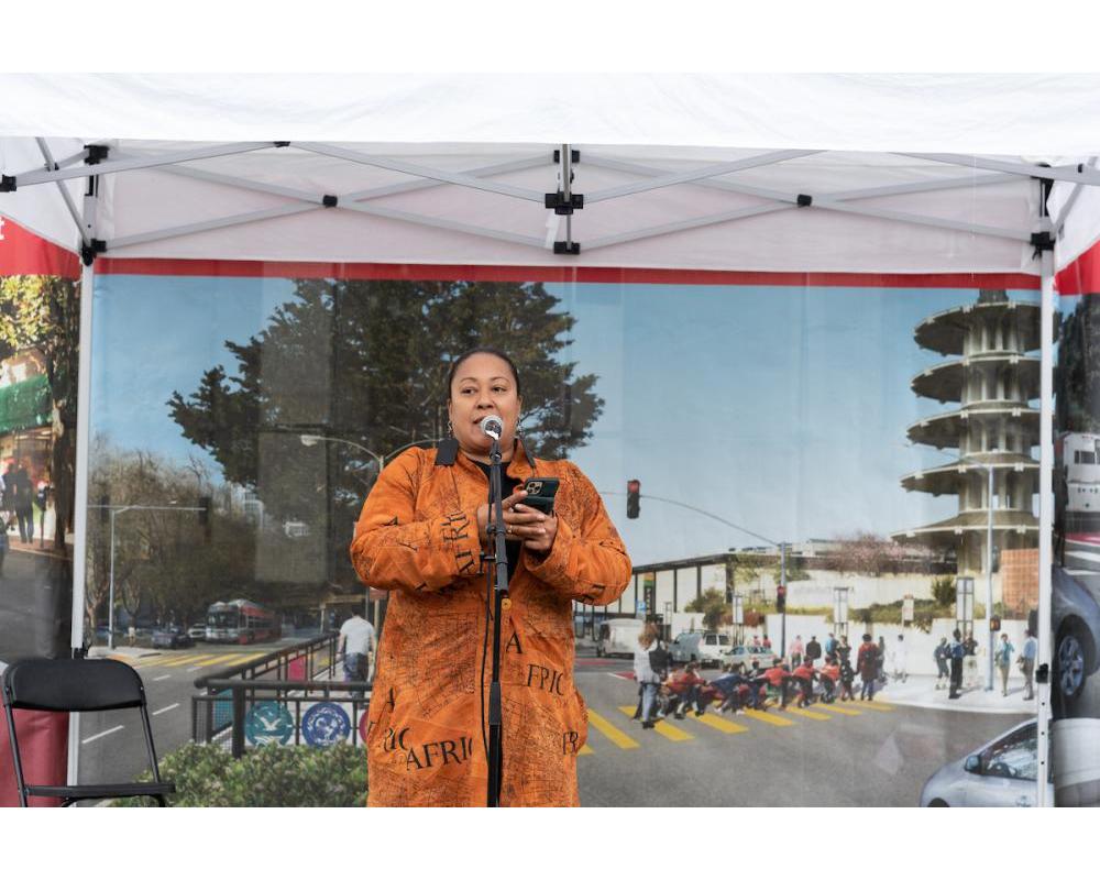Utopia Hammond recites spoken word at the post-ceremony community celebration