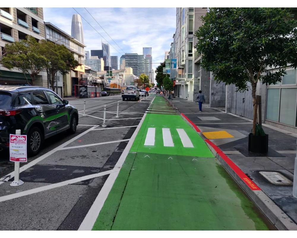 Protected bikeway with new curb ramp