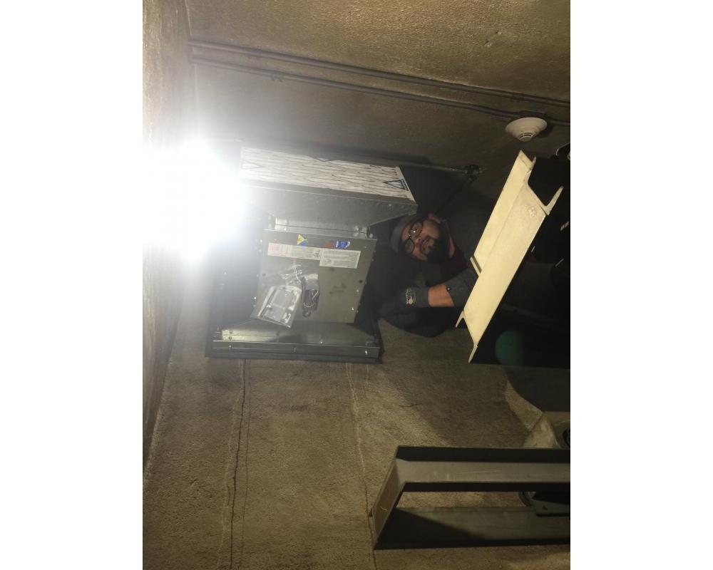 Mechanical Systems install a new fan and filter for a Traction Power room