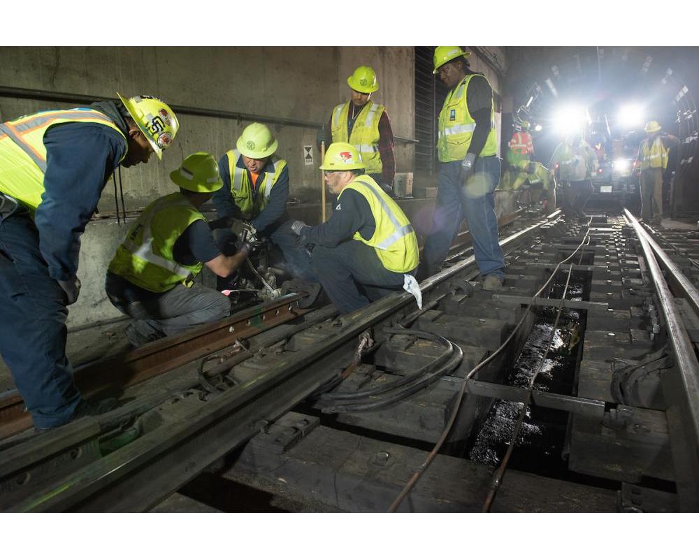 SFMTA Track Maintenance installs new rails at the Embarcadero Crossover 