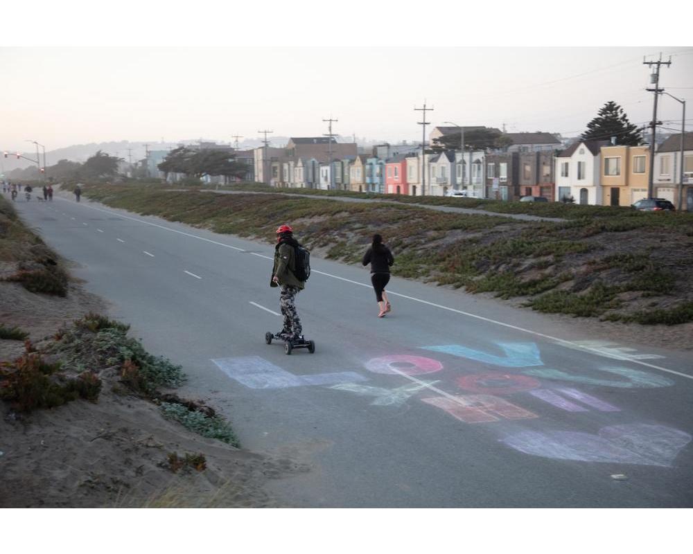Runner and Skateboarder on Great Highway