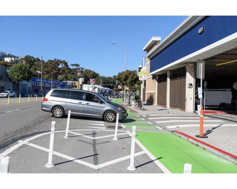 Vehicle entering Lowe's Driveway and Crossing Bike lane (September 2023)