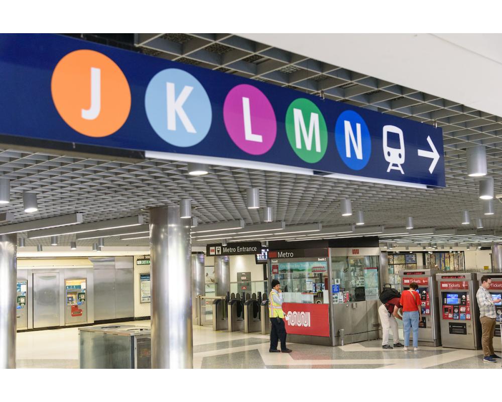 A photo of test signs at Powell Station, with additional new signage visible in the background.