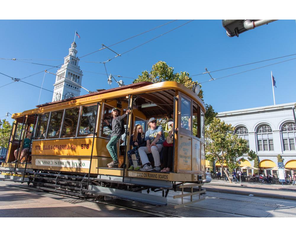 People enjoying the free rides with Streetcar ‘Dinky’ 578 during Muni Heritage Weekend 