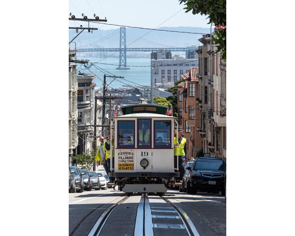 Cable Car Big 19 operating with Bay bridge in the background