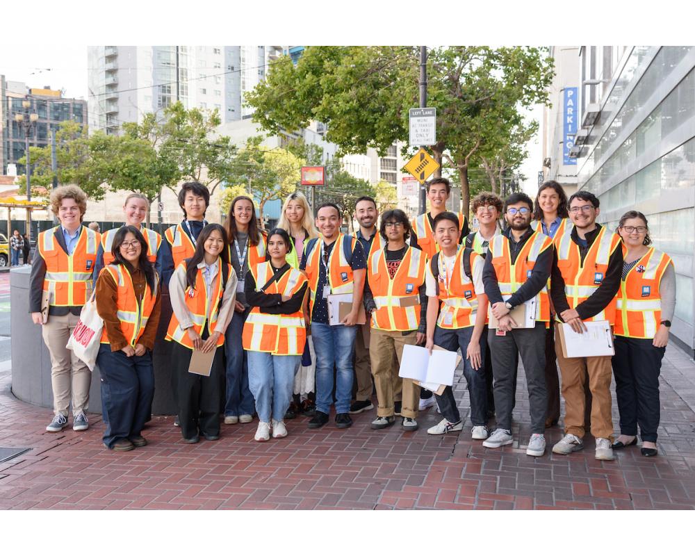 The 2025 interns pose for a group photo on Market street.