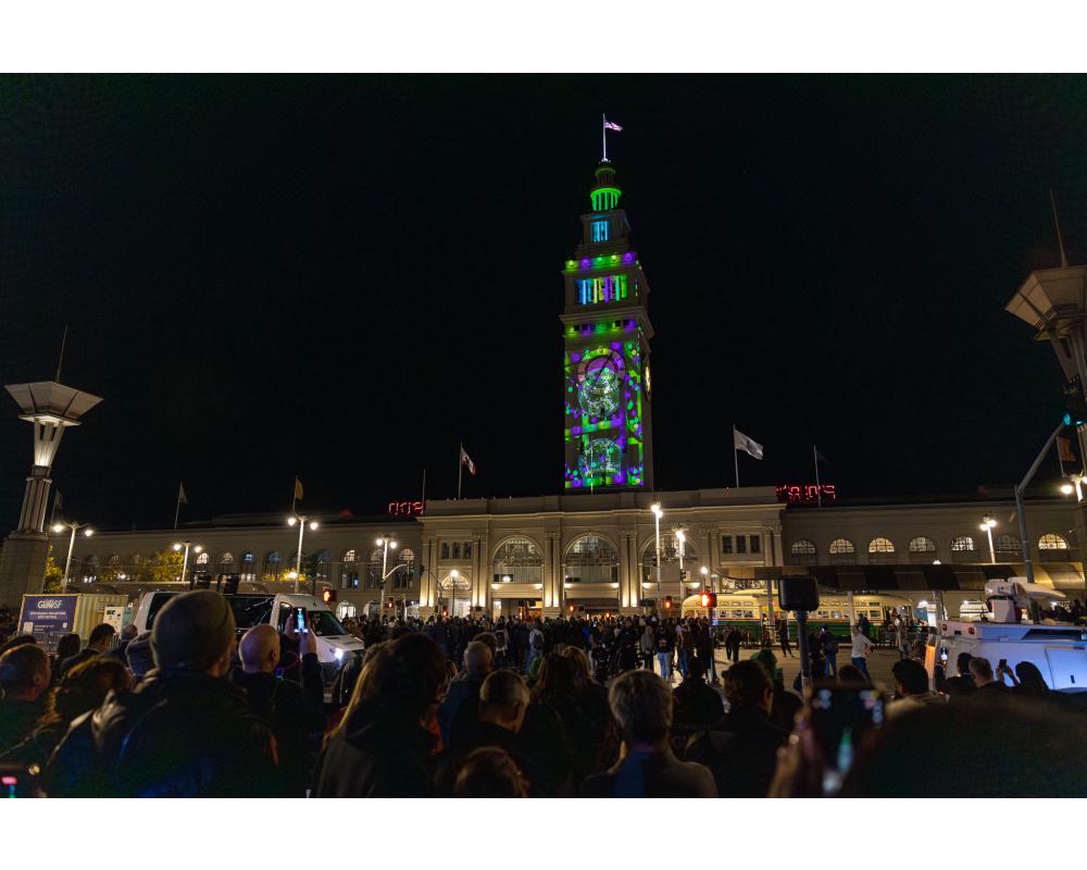 Let's Glow event - Projection art on Ferry building with crowd