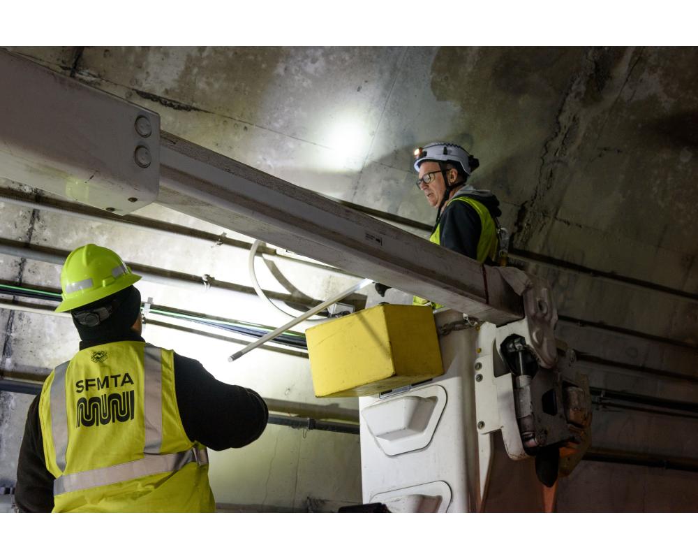 Crew inspecting Sunset Tunnel for a Fix It! Weekend event.