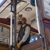 A cable car conductor rings the bell as part of the 2017 contest