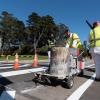 Paint crews working on a crosswalk
