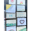Large store front window with art
