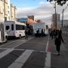Photo of shuttles blocking and loading in the Townsend bike lane and no sidewalk for pedestrians - November 2016