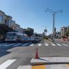 Image of cars stopped at new traffic signal at Cook Street