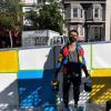 Simón Malvaez with his mural "Them (Ramp)"