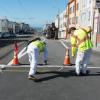 Photo of crew painting new safety striping on Taraval Street