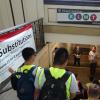 Photo of interns listening to presentation by STMFA staff in stairwell.