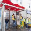 Crews testing the new customer information sign 