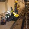 SFMTA Overhead Lines and Underground department perform preventative maintenance on a utility cable box at the Duboce Portal