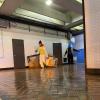 MOW employees clean out a mechanical room at Montgomery Station 