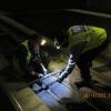 Signal Maintenance staff inspect and repair induction loop cables