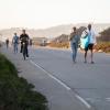 People walking, biking, and rolling along the Upper Great Highway when closed to vehicles