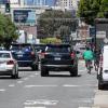 cyclist riding in traffic 