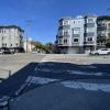 Intersection of Guerrero and 15th streets showing a faded crosswalk