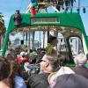 Historical Street Car and Boat Tram passing next to each other 