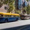 Vintage cars lined up to load passengers during Muni Heritage Weekend