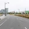 Mission Bay Drive facing east, school in the background