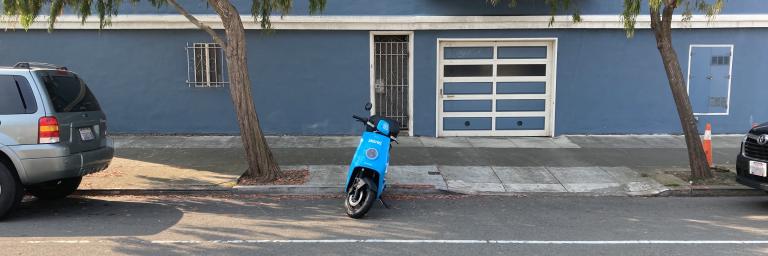 electric moped parked on Cabrillo Street, San Francisco