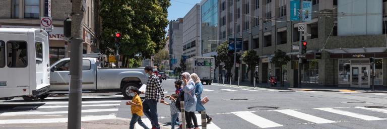 Pedestrians crossing Golden Gate Avenue At Larkin Street 