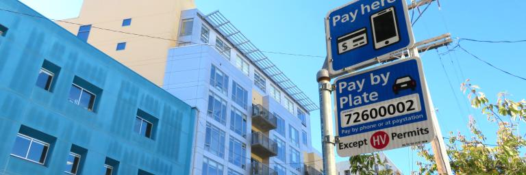 Photo of Pay or Permit sign and Pay Here sign