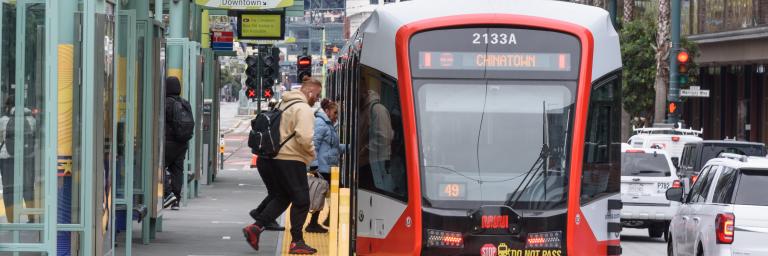 Passengers boarding the T third
