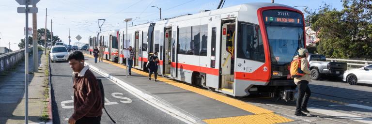 An M Ocean View train stops at a new boarding island at San Jose Avenue and Lakeview Avenue