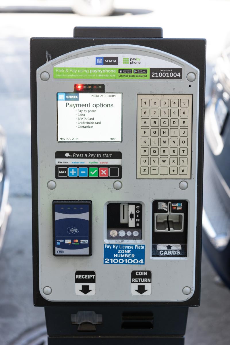 Close-up of view of our new multi-space pay stations. Screen says "payment options" and lists available options in bullet points. Close-up of view of our new multi-space pay stations. Screen says "payment options" and lists available options in bullet points.