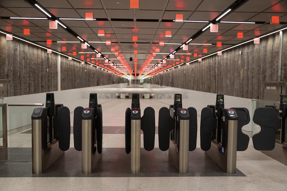 Images of double wide fare gates at Union Square/Market Street Station.