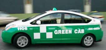 Photo of an Green Cab taxi.