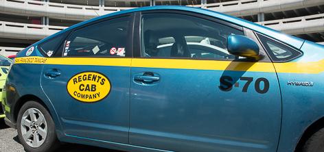 Photo of an Regents Cab taxi.