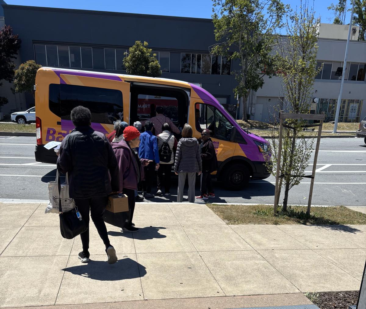 Seniors wait to board a Bayview Shuttle.