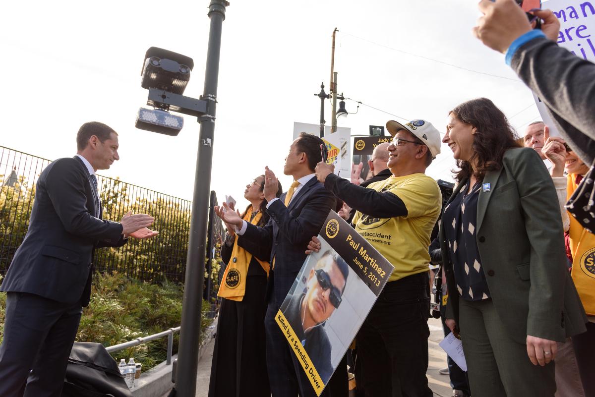 Mayor Daniel Lurie engages with a crowd while launching the speed camera pilot program.