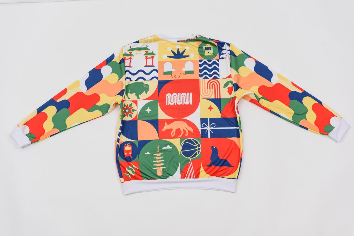 Back of the holiday pullover seen against a white backdrop.