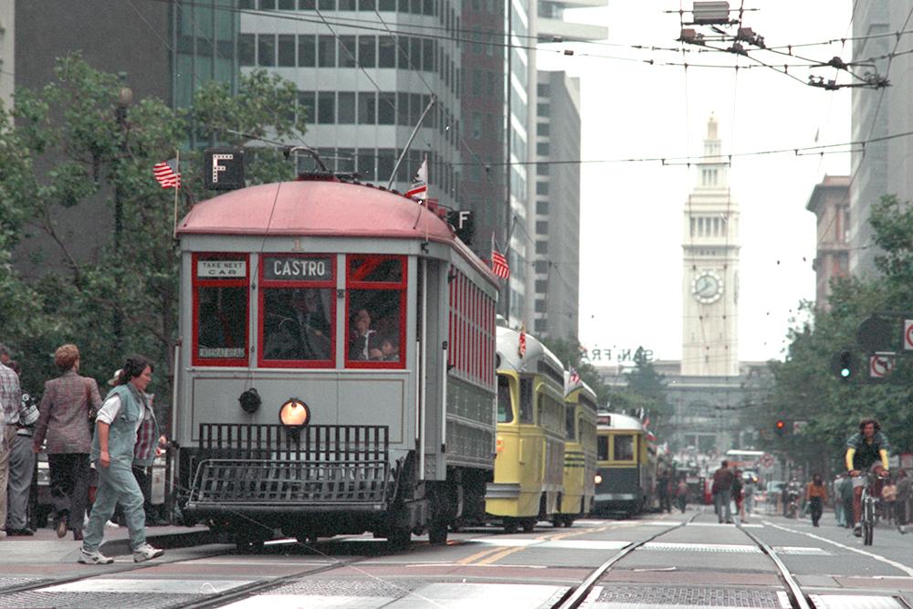 Parade of historic streetcars along Market Street on opening day of the F Market line.