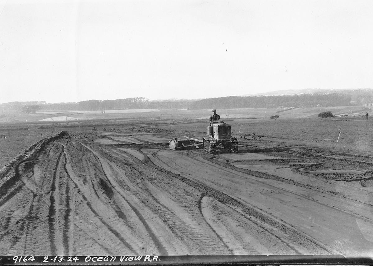 Black and white photo from 1924 showing a dirt field later served by the M Ocean View.