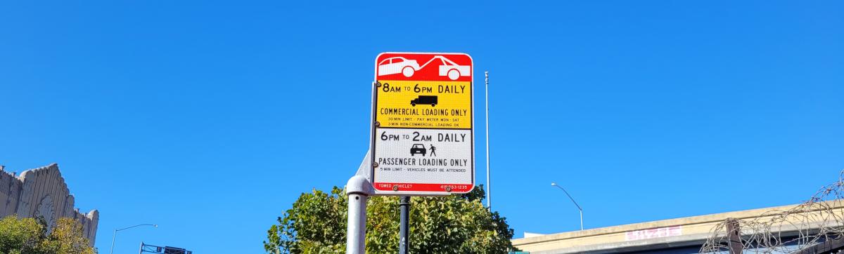 Commercial loading and passenger loading zone sign.