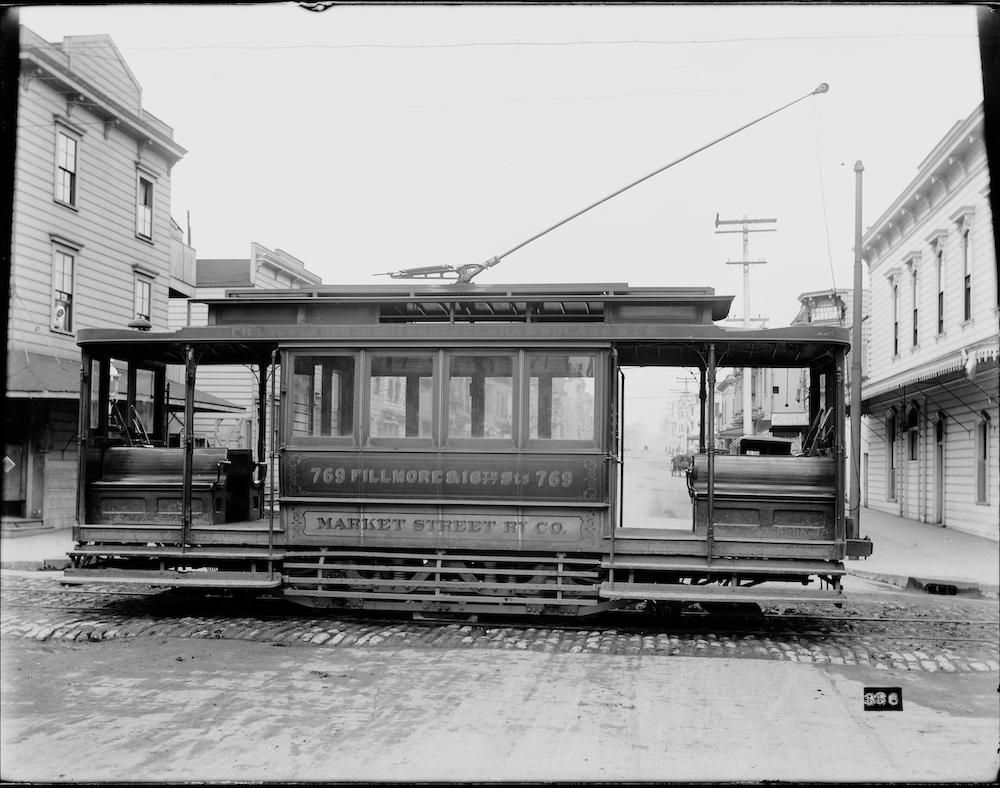 Black and white photo featuring a 22 Fillmore streetcar from 1895.