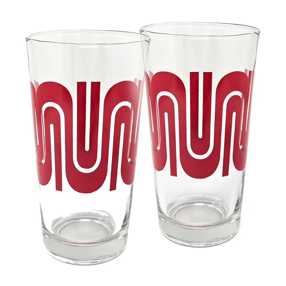 Two pint glasses with Muni worm logo