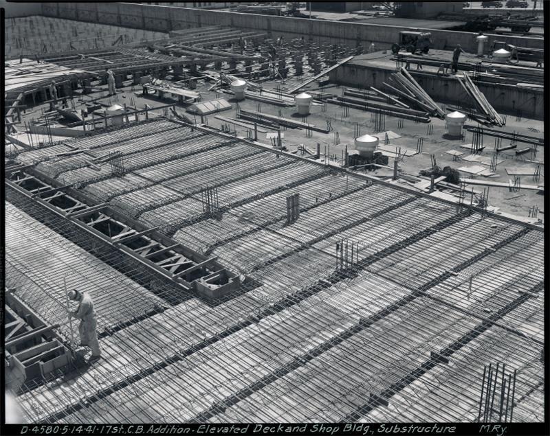 Black and white photo of Potrero Yard with upper deck under construction.