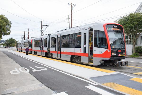 An M Ocean View train stops at a new boarding island at San Jose Avenue and Lakeview Avenue