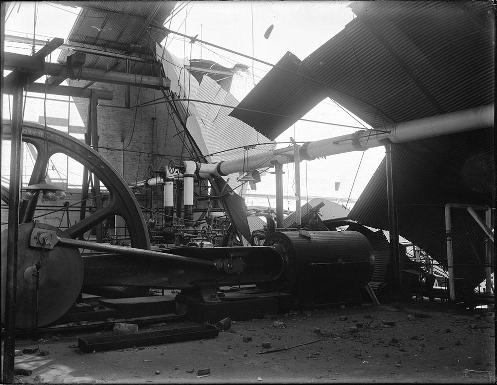 A steam engine that pulled cables for Market Street cable cars sits underneath the collapsed roof.